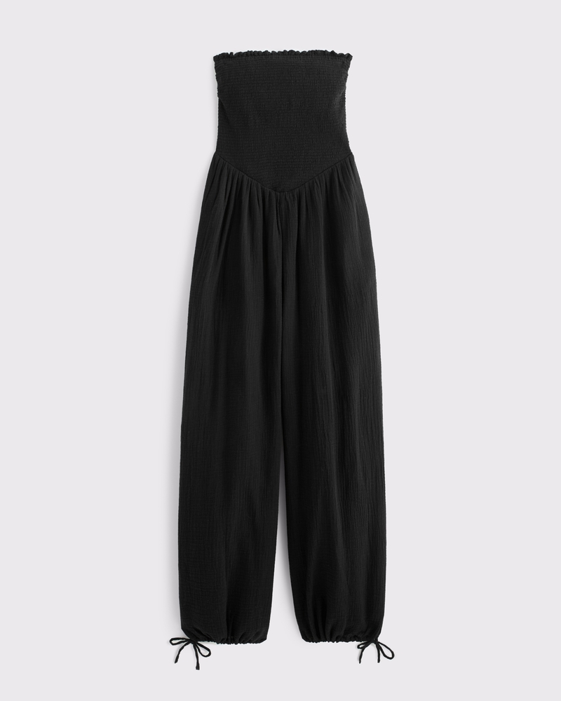 Black strapless wide-leg wedding guest jumpsuit for a summer wedding
