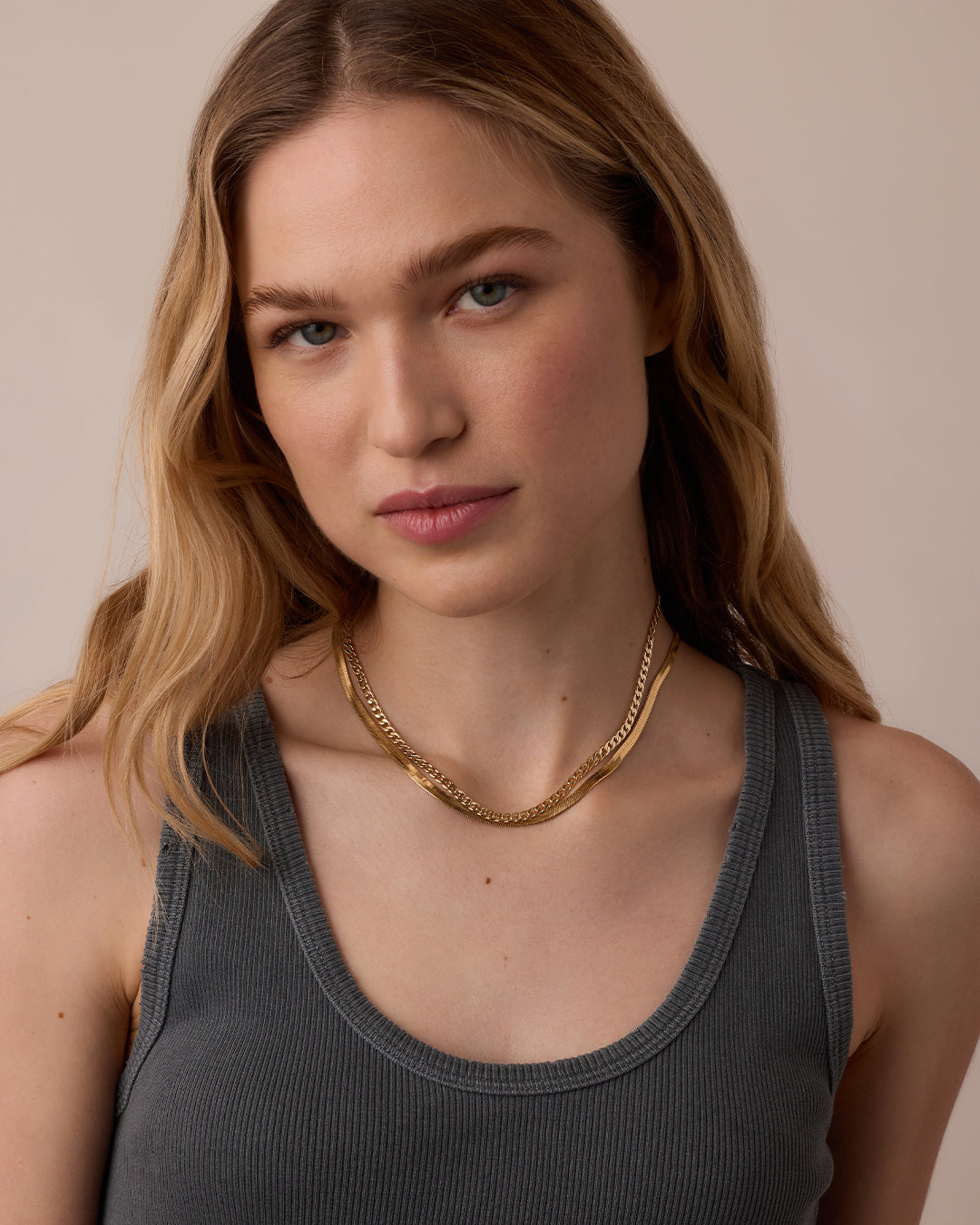 Demi-fine gold herringbone layering necklace flat lay