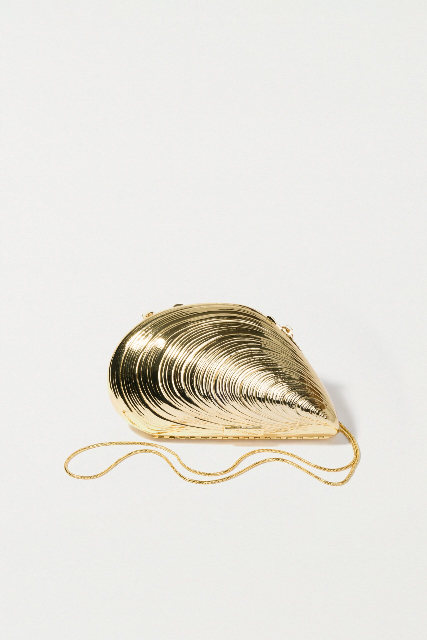 Simkhai Bridget gold metal shell evening clutch