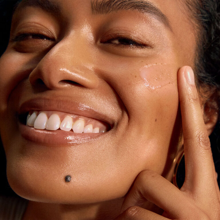 Woman applying peptide serum to face — best peptide serums under $100 for mature skin 2026